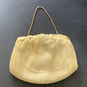 Butter Yellow Clutch with Hidden gold wrist strap